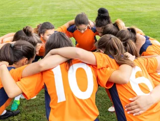 a group of girls in a circle
