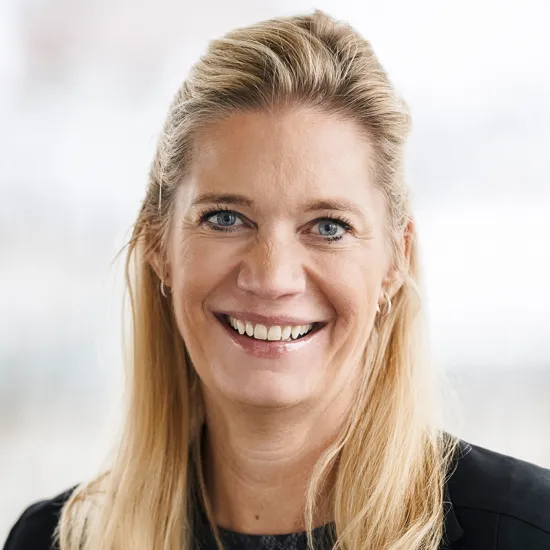 a woman smiling at the camera